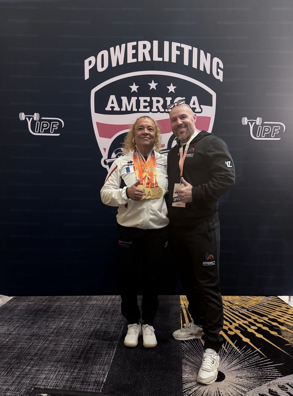 Framboise Labat, championne du monde Master 4 -84 kg, avec son coach du jour J Karim Houas